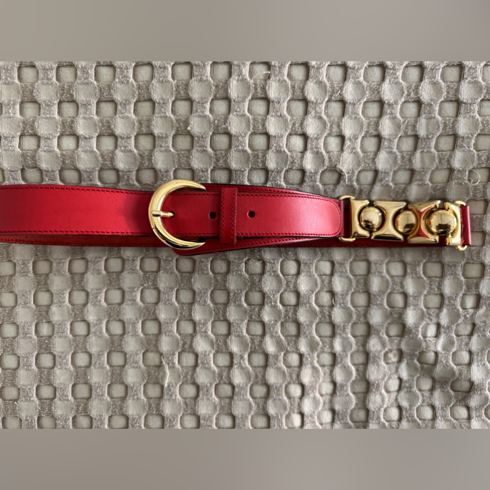 Vintage Made In Italy asymmetrical red and gold belt.